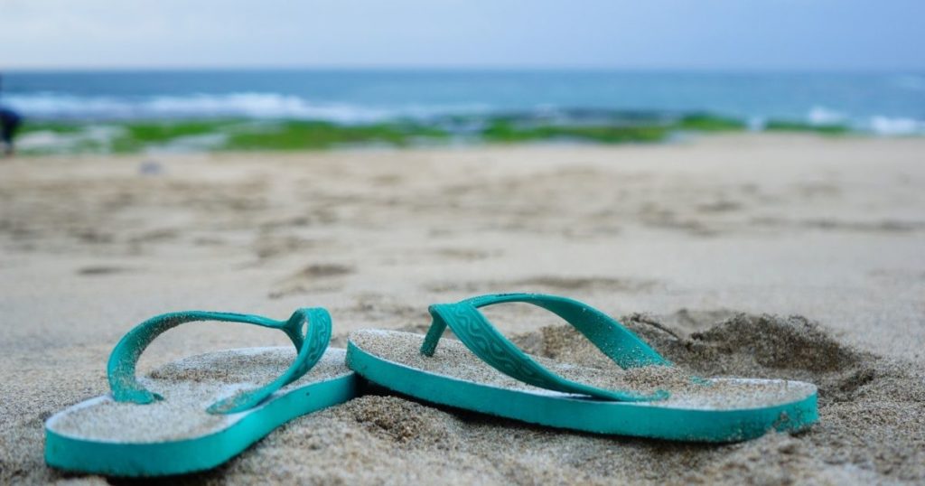 Slippers on sand