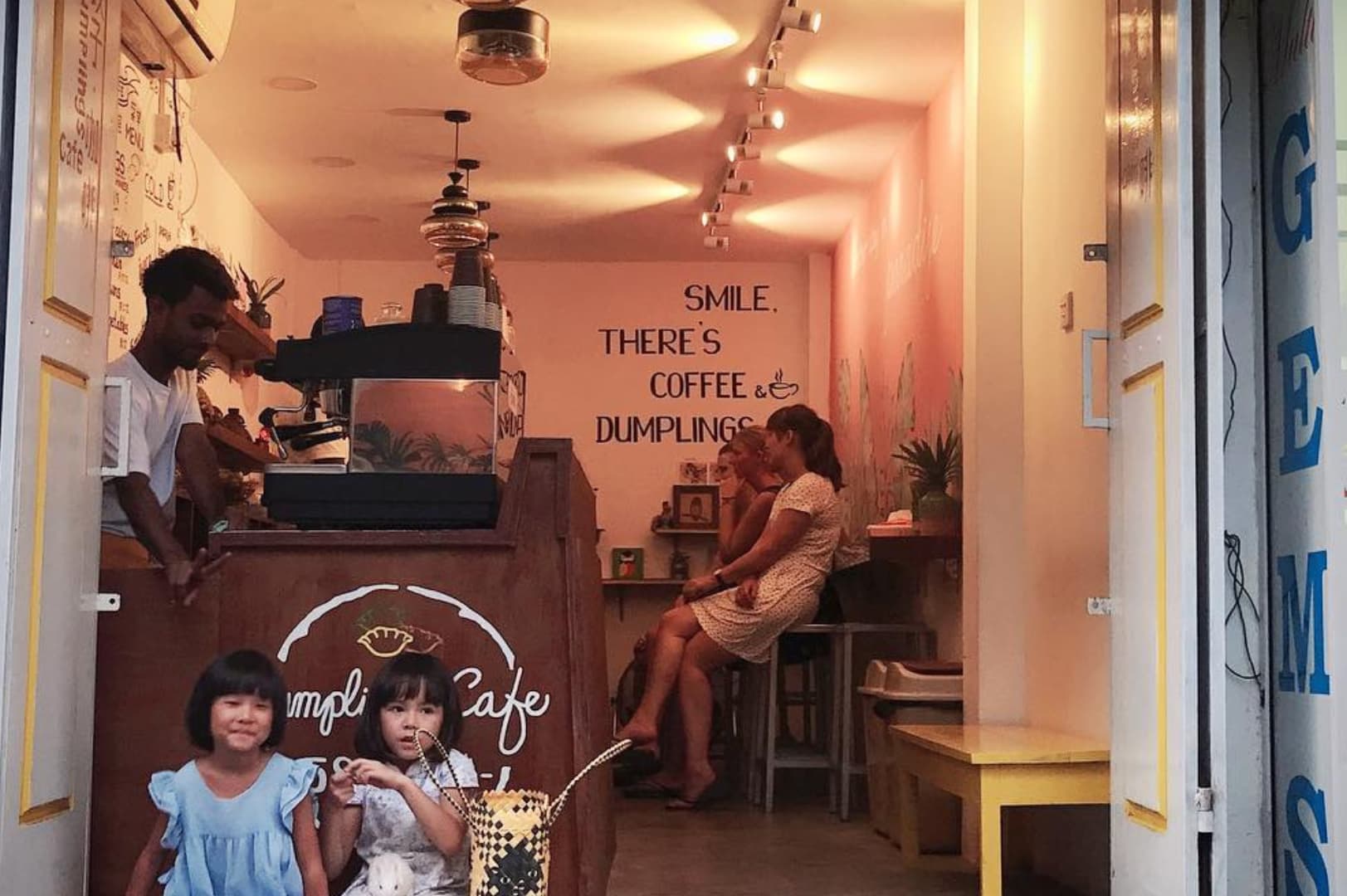 Child seating front of store